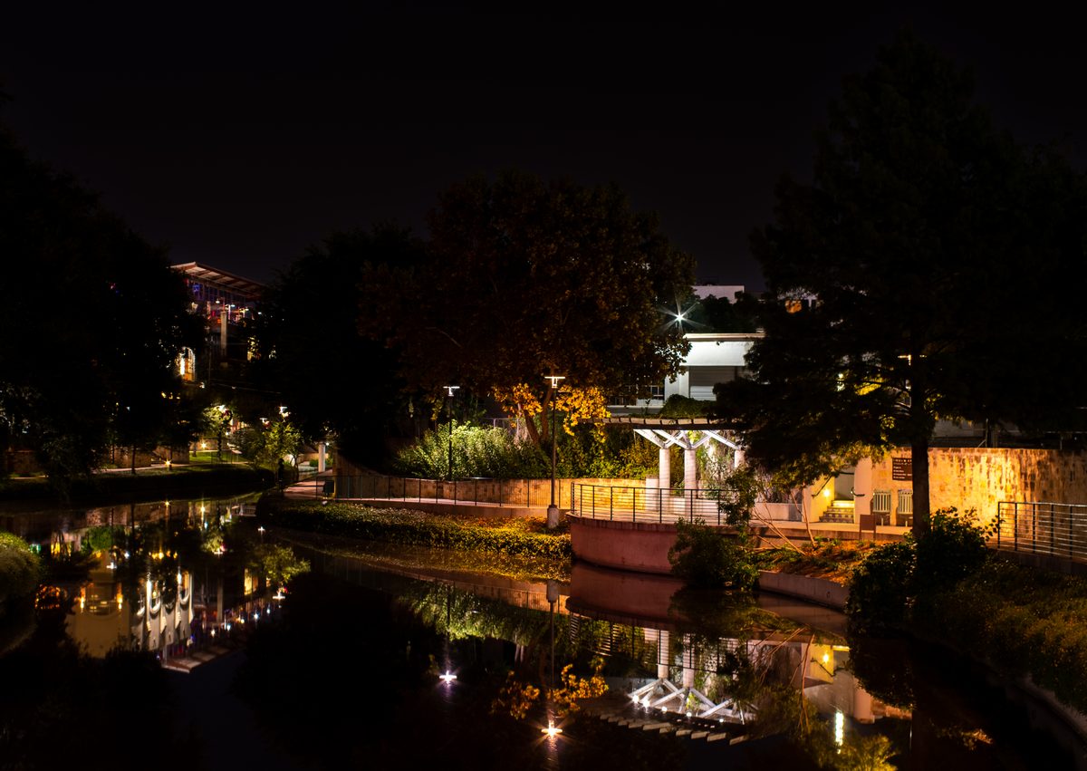 Reflections on the San Antonio River Walk in downtown San Antonio, Texas